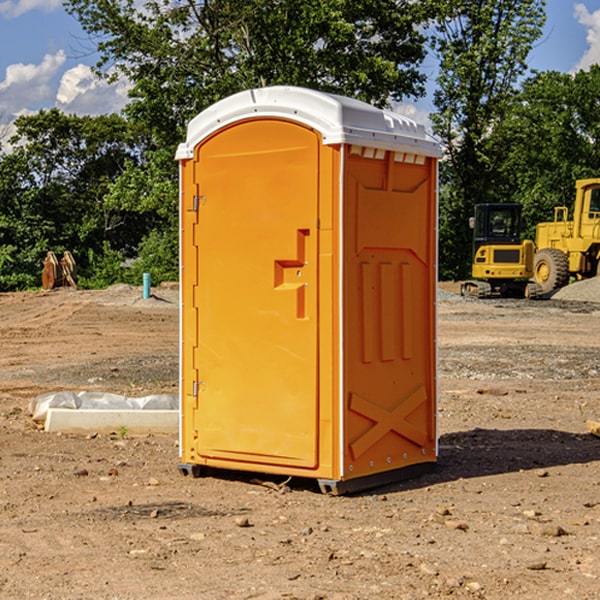 how often are the portable restrooms cleaned and serviced during a rental period in Delphia